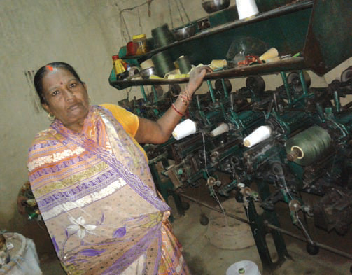 Ms. Kunti Devi from Chhapakaiya Women Group promoted by Birgunj branch of Parsa district in her thread mill.