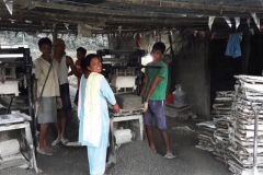 Ms. Phulan Thapa from Nursery Women Group promoted by Dulegouda branch of Tanahu district working in her cement block factory.