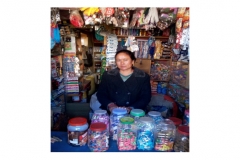 Cheering Yangjum Lama of Simikot branch , Humla infront of the grocery store financed by the Nirdhan Utthan Bank ltd loan of NPR 60,000.00.