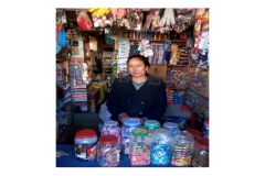 Cheering Yangjum Lama of Simikot branch , Humla infront of the grocery store financed by the Nirdhan Utthan Bank ltd loan of NPR 60,000.00.